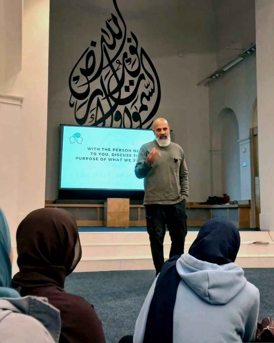 Mubeen Azam presenting at a Time for Change session in Birmingham