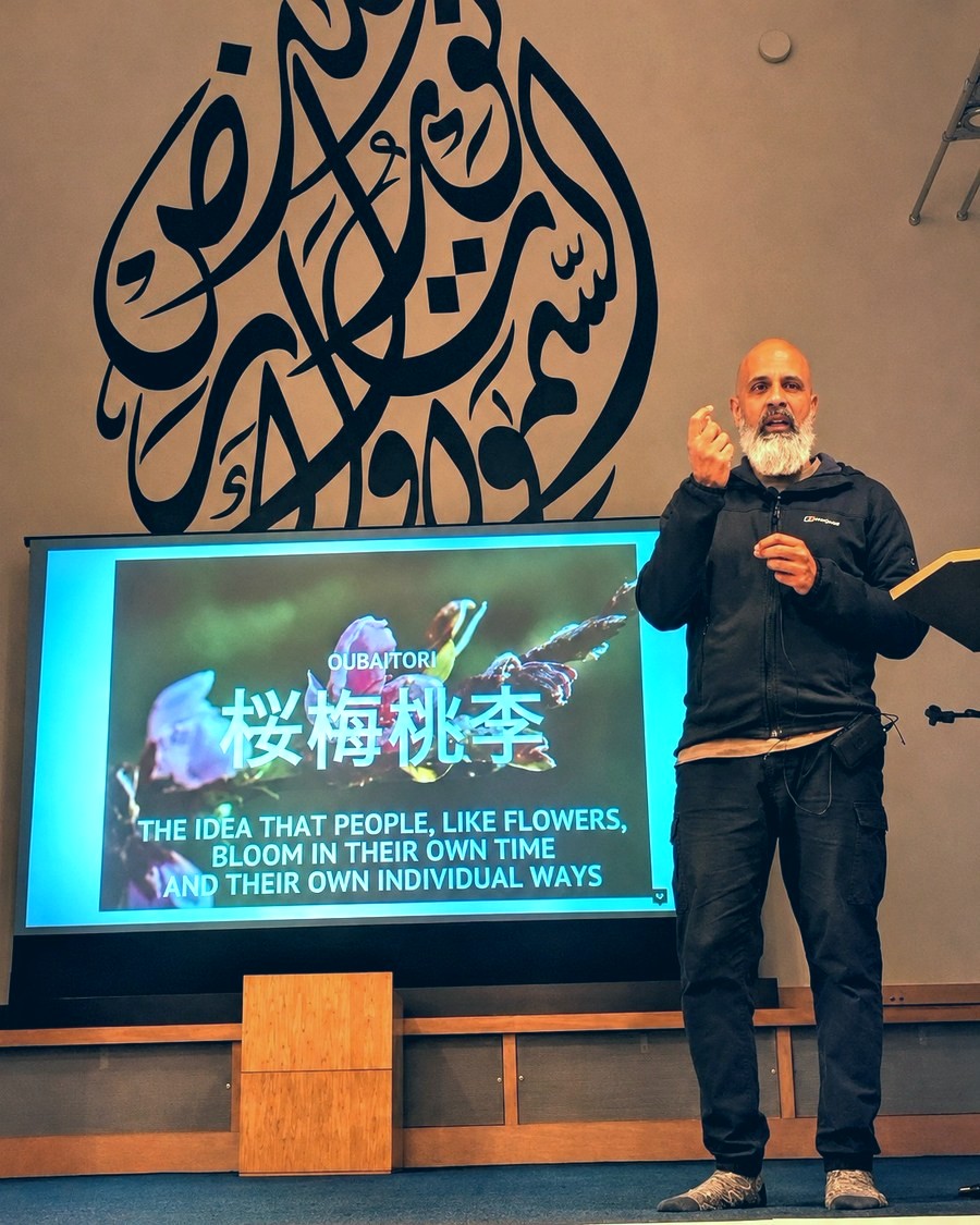 Mubeen Azam presenting during a Time for Change session in Birmingham